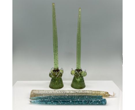 A charming mid-century set featuring two green Lucite candle holders designed with glitter inclusions and flared bases, accom