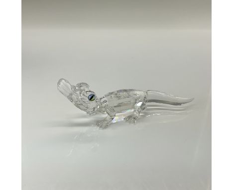 Mini sized alligator with faceted body and black/green eyes. Swarovski crystal acid mark on the base. This item has its origi