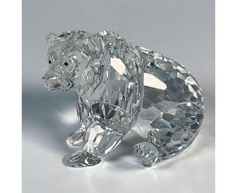 This clear crystal grizzly bear is part of the Rare Encounters grouping. The bear is sitting back on his haunches and his bac