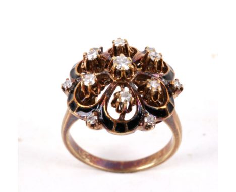 This is a wonderful Art Deco circa 1930’s 14K gold ring showing thirteen diamonds. This diamond cluster ring is set in solid 