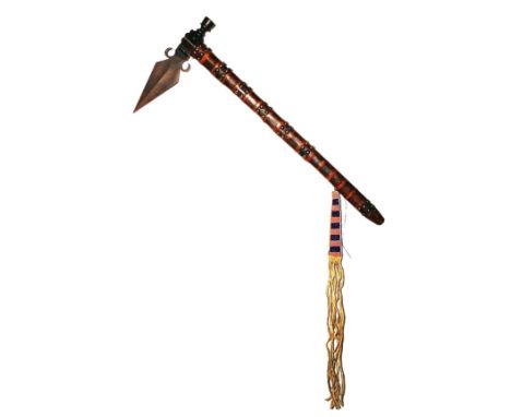 Offered for public sale is this fantastic spontoon pipe tomahawk from the Northern Plains Native American Indians dating to t