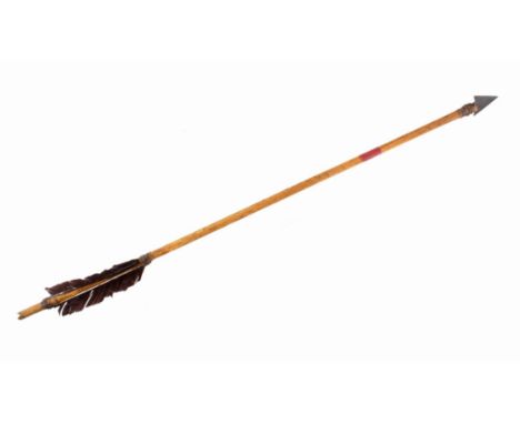 The lot features a single 19th Century Plains Native American Indian arrow. The piece shows a hand-carved wooden haft with a 