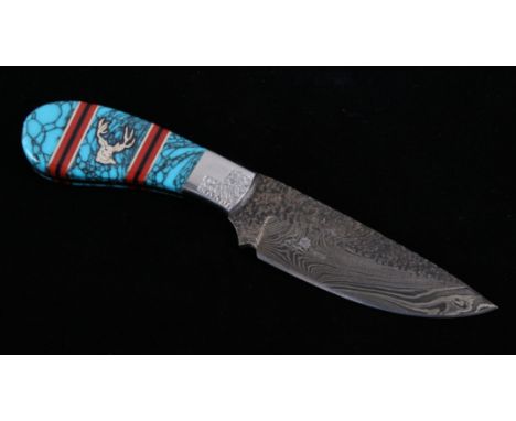 This is the newest offering from our partnership with David Yellowhorse, a Damascus knife set with turquoise, onyx, red coral