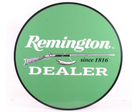 Offered in this lot we have a Remington dealer advertising sign. The sign shows a primarily green background with a Remington