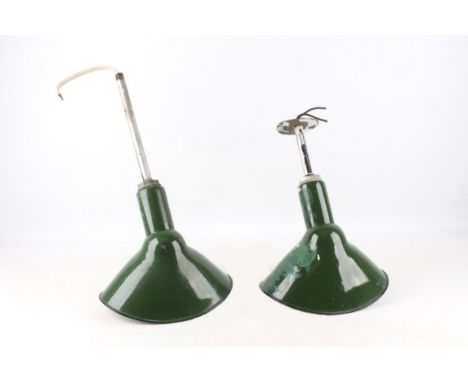 For your consideration are two Benjamin industrial ceiling lights. These light fixtures show a green porcelain enamel with an