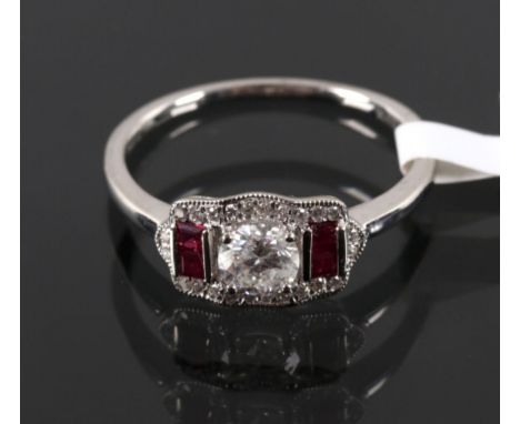 The lot features this excellent estate ring set with Diamonds and Rubies in solid Platinum. The ring shows an Antique 1930’s 