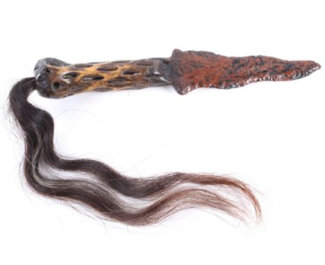 Included in this lot we have a Diamond willow and mahogany obsidian kris dagger. The dagger displays a double edged kris styl