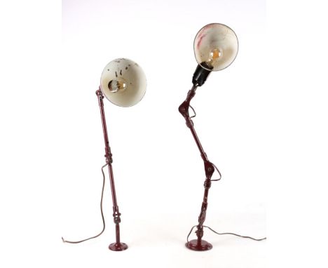For your consideration are two adjustable arm, articulating industrial work lamps. One is unmarked with similar build and sty