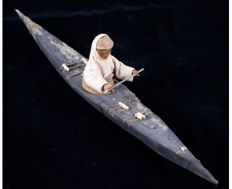 The lot features an excellent Eskimo Inuit Native American Indian model kayak dating from circa 1900. The piece shows a wood 