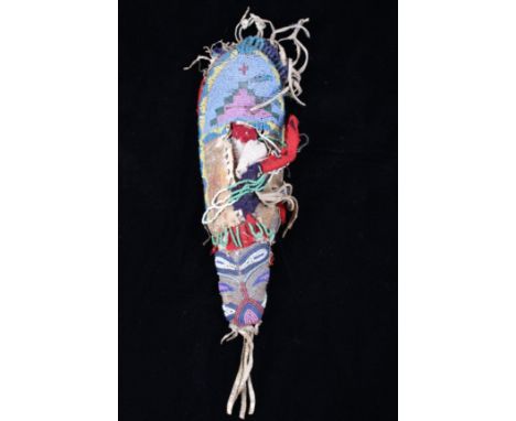 The lot features an excellent toy papoose cradleboard from the Northern Cheyenne Native American Indians dating to circa 1870