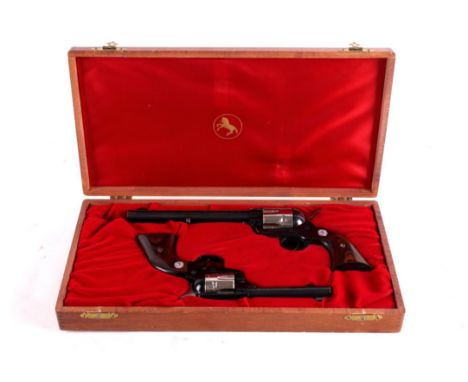 Included in this lot we have a very hard to find matching set of Single Action Army and Frontier Scout revolvers from Colt. T