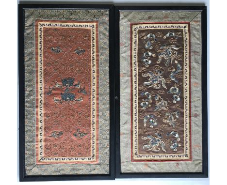 TWO CHINESE SILK PANELS the first worked in silk and gilt thread with moths and flowers on a dark gold coloured ground, the s