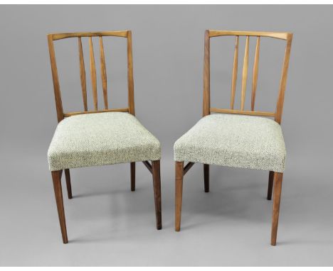 GORDON RUSSELL - SET OF DINING CHAIRS, DESIGN COUNCIL a set of 8 walnut stick back dining chairs with upholstered seats, from