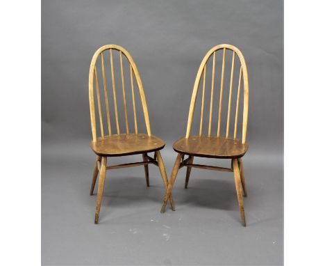 ERCOL DINING CHAIRS a set of 4 light coloured stick back chairs. (4)