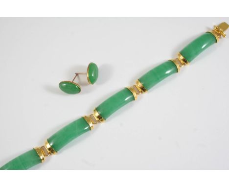 A JADE AND GOLD PANEL BRACELET formed with five rectangular panels of jade with gold terminals, 19cm long, together with a pa