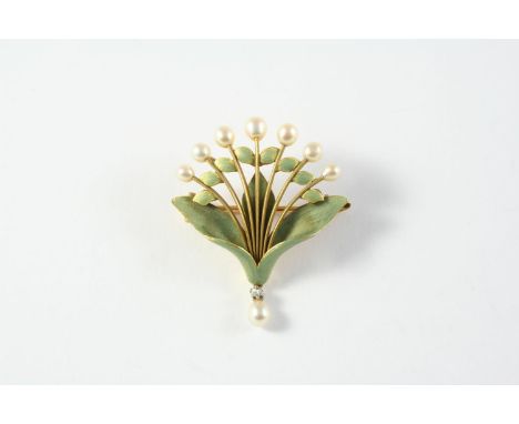 AN ART NOUVEAU ENAMEL AND PEARL FOLIATE BROOCH the green enamel mount set with small pearls and suspending a pearl and diamon