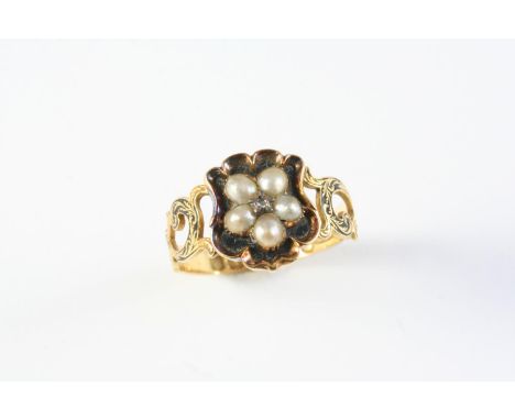 A VICTORIAN BLACK ENAMEL, PEARL AND GOLD RING the central section of black enamel with applied flowerhead set with half pearl