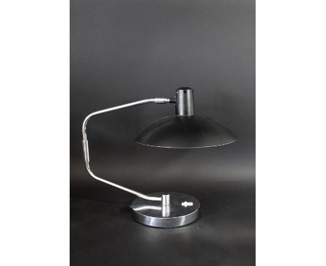 DESIGNER DESK LAMP circa 1960's, an interesting lamp with a large black shade supported on a rotating chrome arm. With a chro