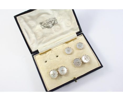 A PAIR OF MOTHER-OF-PEARL AND GOLD CUFFLINKS each mother-of-pearl disc is set in 9ct gold, together with two matching dress b