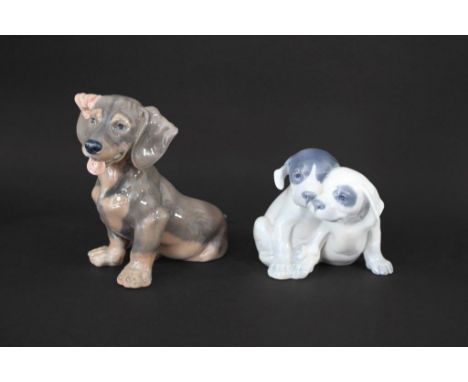 ROYAL COPENHAGEN DOGS including Model No 856 Large Dachshund Puppy, and No 260 Pointer Puppies. Both marked for Royal Copenha