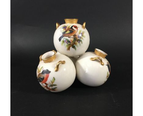 ROYAL WORCESTER ORNITHOLOGICAL VASE date code for 1875, as a pile of four spherical, two handled vases, painted in the manner