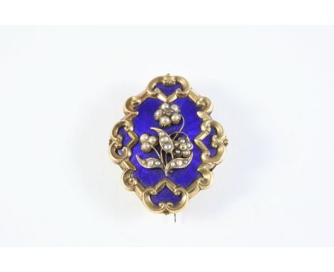 A VICTORIAN ENAMEL, PEARL AND GOLD BROOCH the central section of royal blue guilloche enamel with applied foliate decoration 