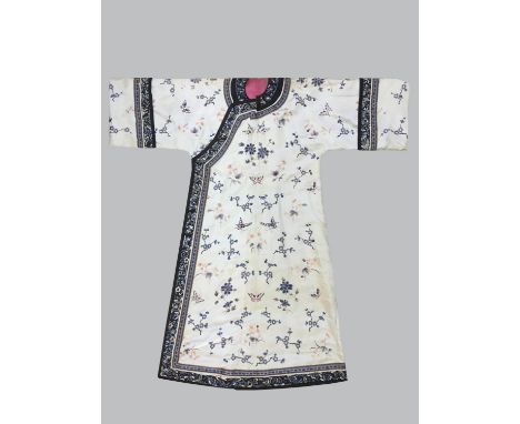 CHINESE SILK GOWN late 19th or early 20th century, worked in silk in various knots with butterflies, moths, prunus and peach 