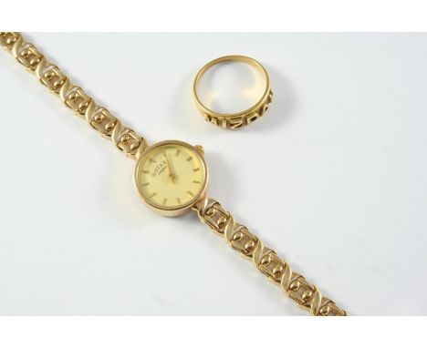 A LADY'S 9CT GOLD WRISTWATCH BY ROTARY the signed circular dial with baton numerals, on a 9ct gold fancy link bracelet with l