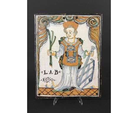 CONTINENTAL FAIENCE PLAQUE probably Nevers, France, painted with a portrait of St Lawrence holding a grid iron and palm leaf 