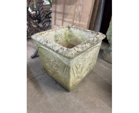 A square concrete garden planter 