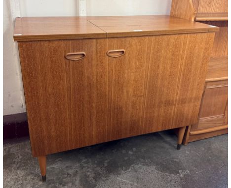 A Singer 744 model teak sewing machine cabinet 