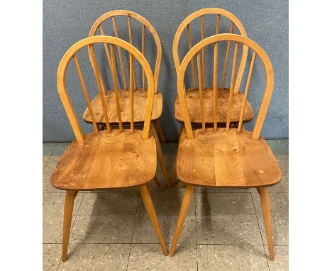 A set of four Ercol Blonde elm and beech Windsor chairs 
