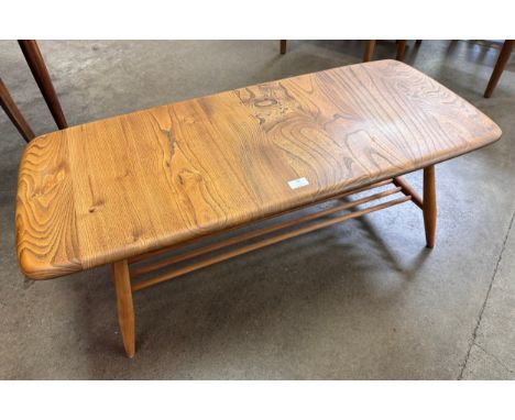 An Ercol Blonde elm and beech Windsor coffee table 