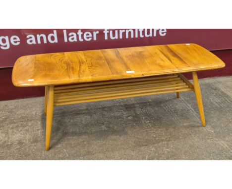 An Ercol Blonde elm and beech Windsor coffee table 