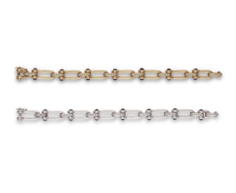 A DIAMOND AND RUBY BRACELET TOGETHER WITH A DIAMOND AND SAPPHIRE BRACELET, BY VOURAKISA fancy-link bracelet interspersed by d