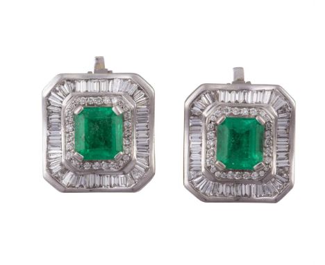 A PAIR OF EMERALD AND DIAMOND EARRINGSEach set with a cut-cornered rectangular step-cut emerald within a double-tiered surrou