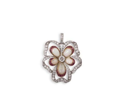 AN EARLY 20TH CENTURY OPAL, RUBY AND DIAMOND PENDANT, CIRCA 1910Designed as a flower head, the openwork petals and stigma set