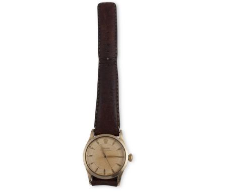 A GOLD PLATED AUTOMATIC WRISTWATCH, BY ROLEX, CIRCA 1950Automatic movement, cream dial with applied polished bullet hour mark