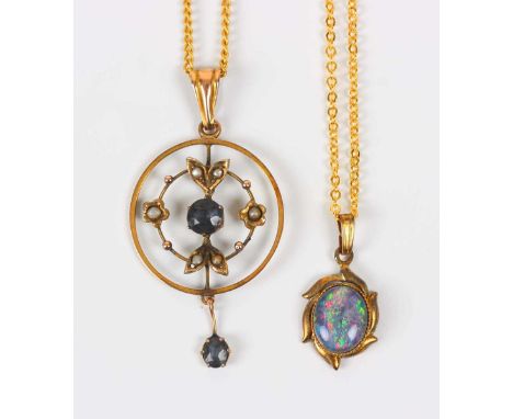 A gold, seed pearl and blue paste pendant of openwork form, detailed ‘9c’, weight 1.7g, length 4.6cm, with a gilt metal neckc