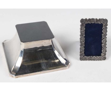 A George V silver inkwell of square tapering form with hinged lid, Birmingham 1927 by Deakin &amp; Francis Ltd, width 9.3cm, 