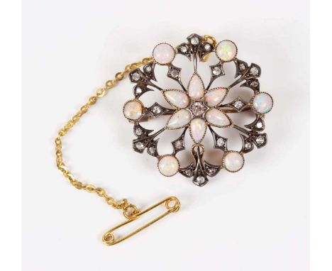 A gold, silver, opal and diamond brooch of shaped hexagonal openwork form, the centre mounted with the principal old cut diam