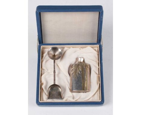 A 20th century sterling silver spirit flask with screw cover, the body with engraved and gilt bamboo decoration, height 5.2cm