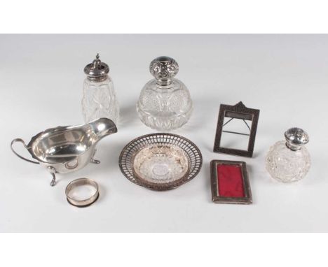 A small group of silver, including a sauceboat, Sheffield 1946, length 15.2cm, a circular butter dish with pierced rim, Birmi