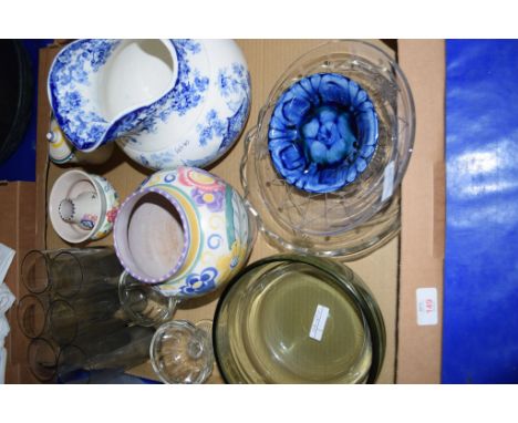 TRAY CONTAINING GLASS WARES AND POTTERY INCLUDING A POOLE POTTERY VASE WITH A FLORAL DESIGN, POSSIBLY BY TRUDA CARTER