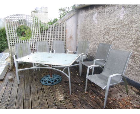 Six lightweight metal garden chairs with panelled seats and back together with a matching table