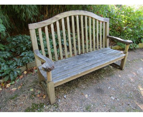 A weathered teak wood garden bench, 160cm wide 