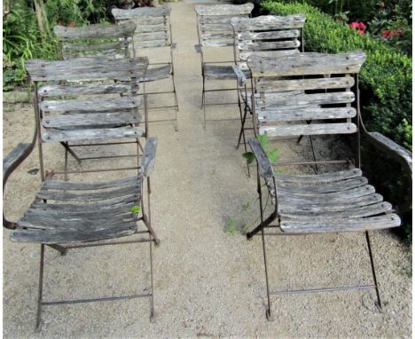 A set of six vintage folding garden armchairs with steel frames and teakwood lathe backs, seats and arms 