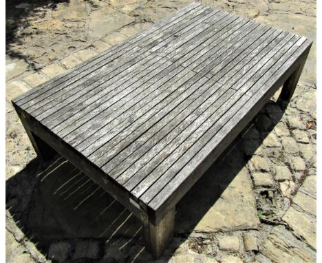 Good quality weathered teak low garden occasional table with slatted top, 115cm x 70cm x 33cm 