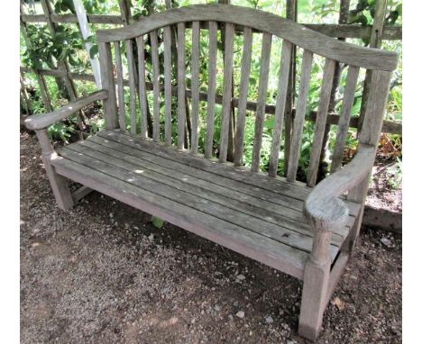 A weathered teak wood garden bench, 160cm wide 