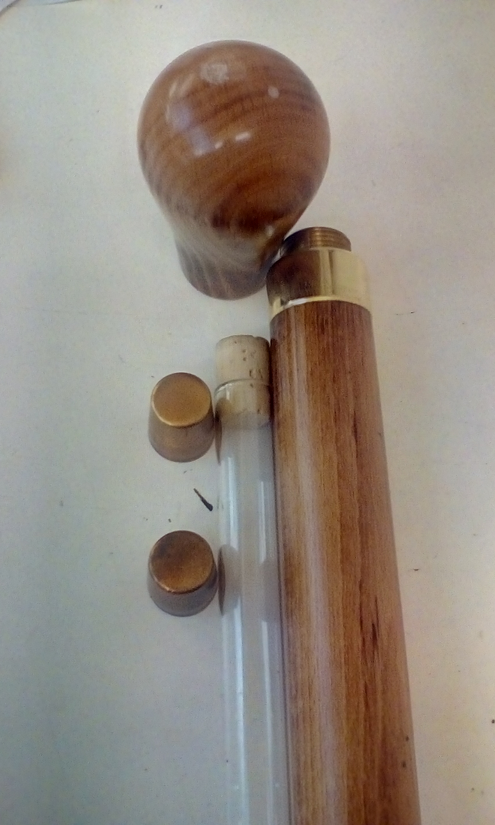 Walking stick with internal whisky flask